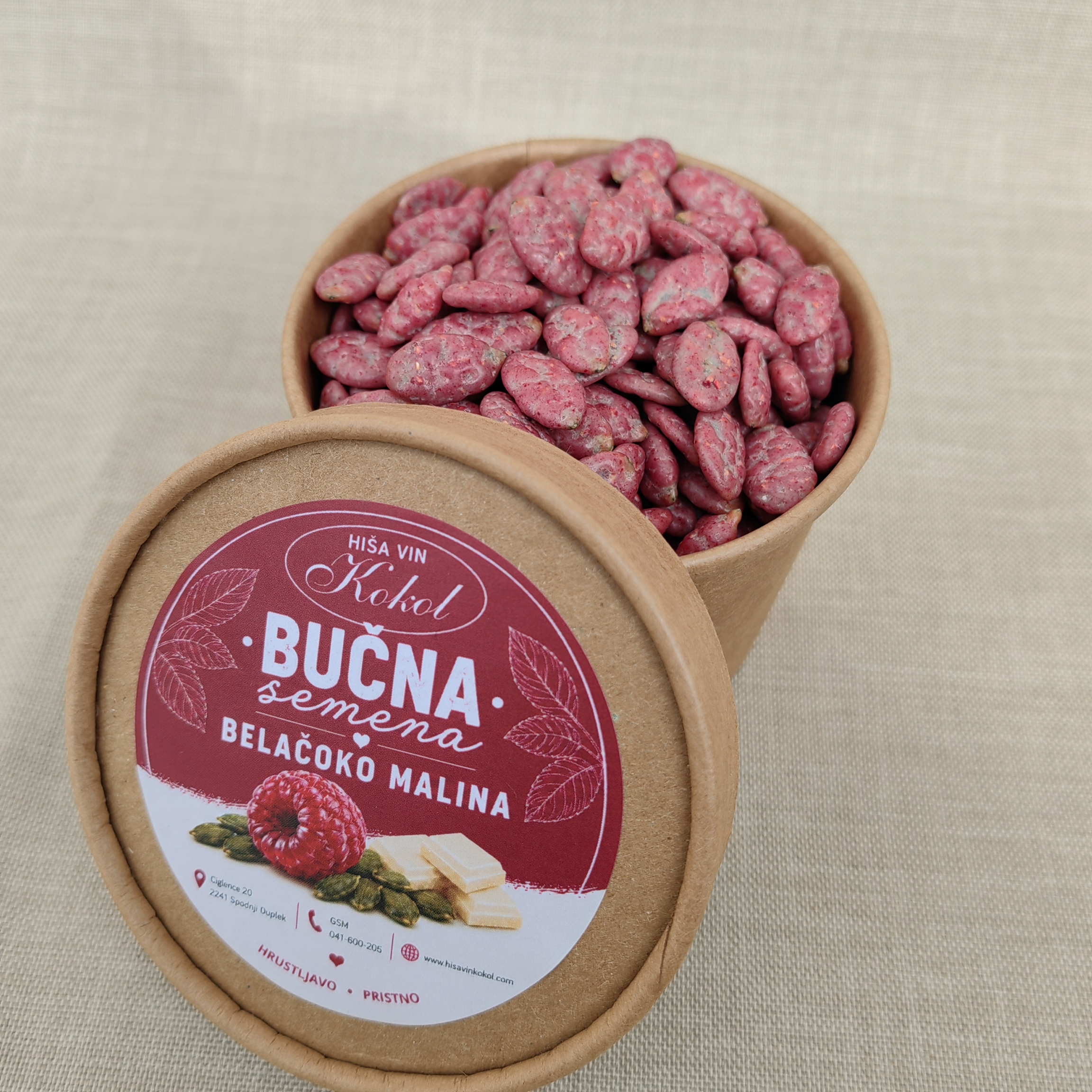 bučna seman oblita z belo čokolado in malino _hiša vin kokol bučna seman oblita z belo čokolado in malino _hiša vin kokol