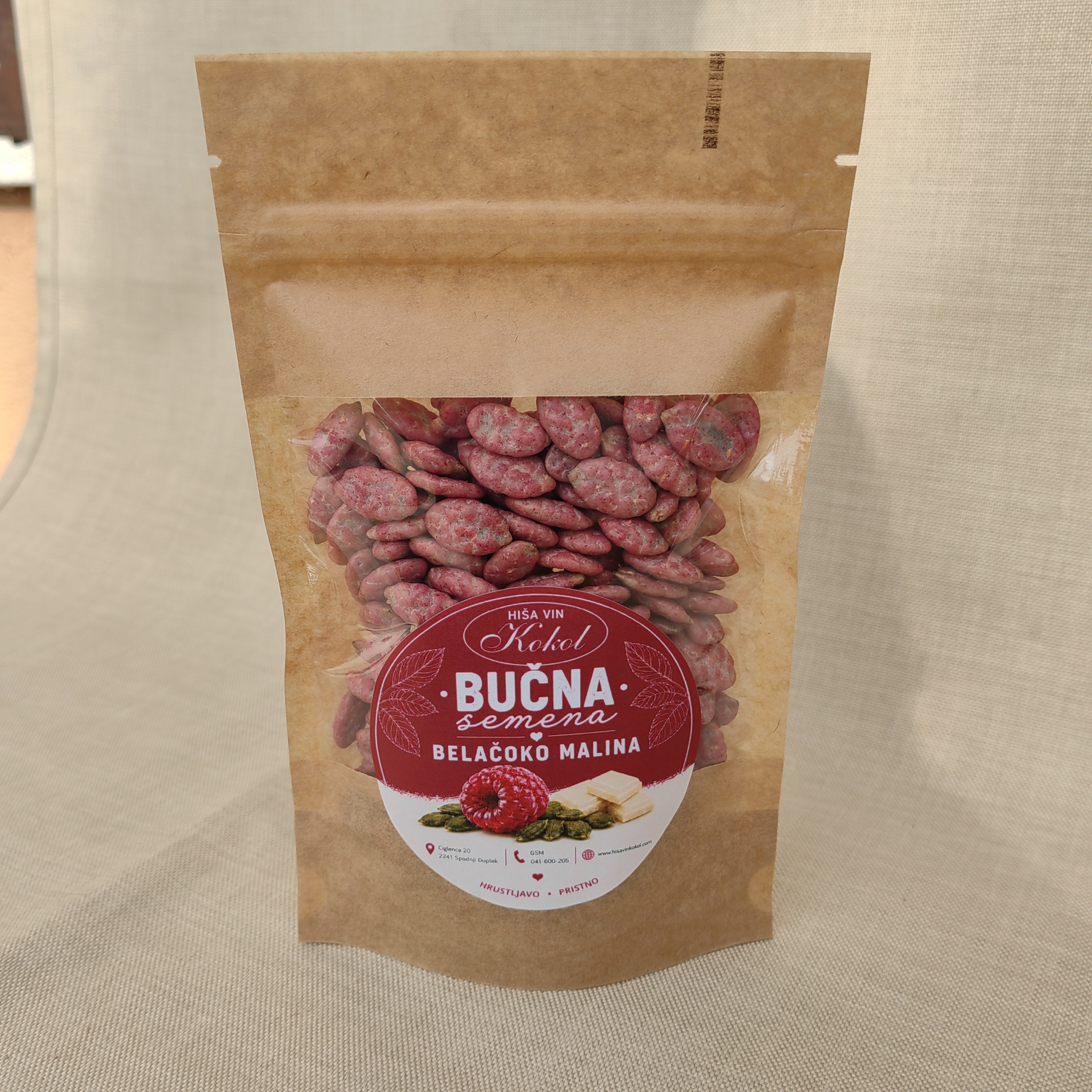 bučna seman oblita z belo čokolado in malino _hiša vin kokol bučna seman oblita z belo čokolado in malino _hiša vin kokol